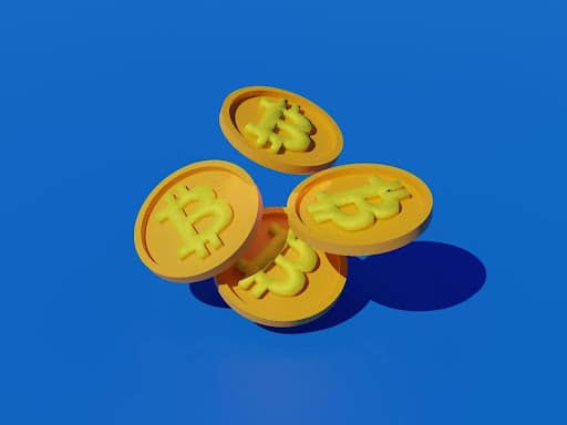 4 animated bitcoins on a blue background