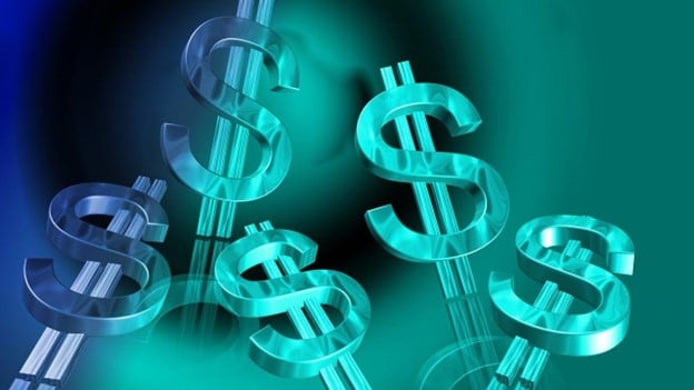 Multiple dollar signs with a green background