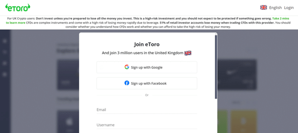 eToro registration page for UK users, highlighting options to sign up using Google, Facebook, or email for trading Tesla shares.